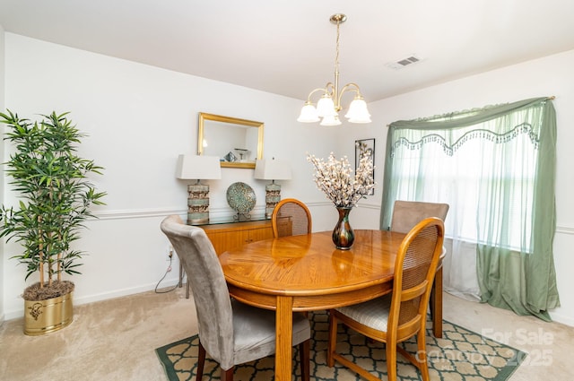 6619 Bittinger Ct, Charlotte, NC 28216 - dining room with a chandelier and light colored carpet