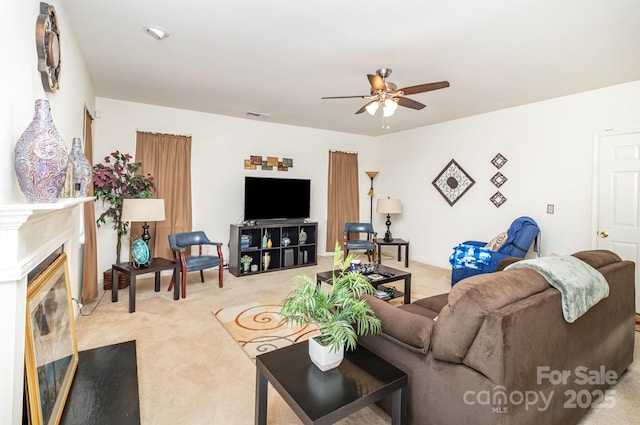 6619 Bittinger Ct, Charlotte, NC 28216 - living room featuring a ceiling fan, light colored carpet, and a fireplace with flush hearth