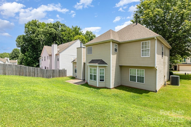 6619 Bittinger Ct, Charlotte, NC 28216 - back of house featuring a shingled roof