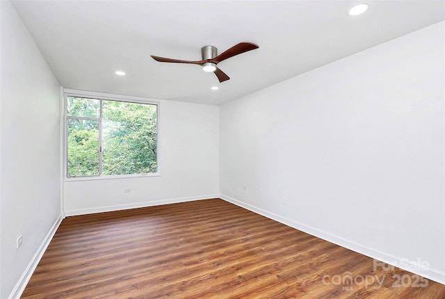 1300 Queens Rd Unit 405, Charlotte, NC 28207 - unfurnished room with a ceiling fan, recessed lighting, and wood finished floors