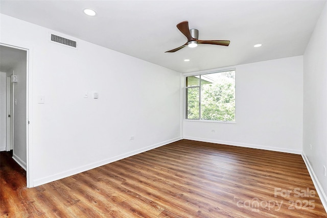 1300 Queens Rd Unit 405, Charlotte, NC 28207 - unfurnished room featuring wood finished floors, a ceiling fan, and recessed lighting