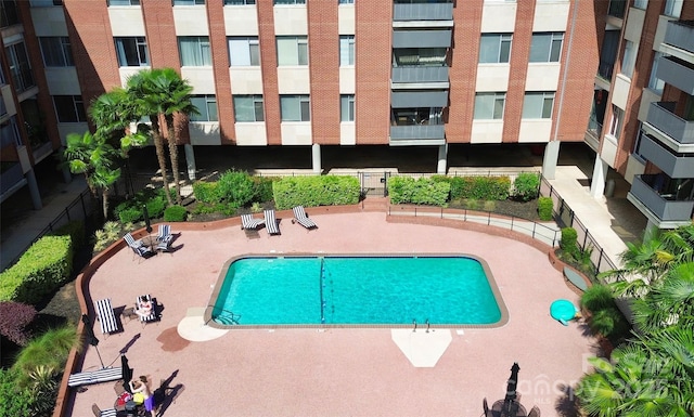 1300 Queens Rd Unit 405, Charlotte, NC 28207 - community pool featuring a patio area