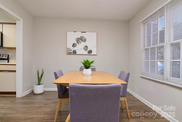 825 21st Ave NE, Hickory, NC 28601 - dining space featuring dark wood finished floors and healthy amount of natural light