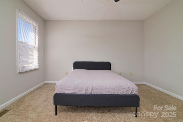 825 21st Ave NE, Hickory, NC 28601 - carpeted bedroom featuring baseboards