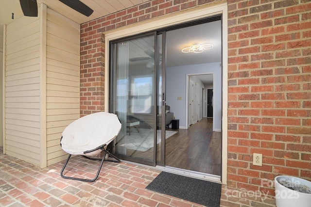 825 21st Ave NE, Hickory, NC 28601 - property entrance featuring brick siding and a ceiling fan