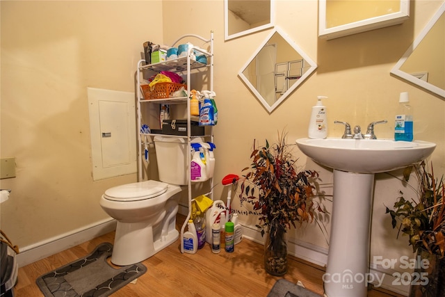 517 Fieldcrest Dr, Chester, SC 29706 - bathroom with electric panel and wood finished floors