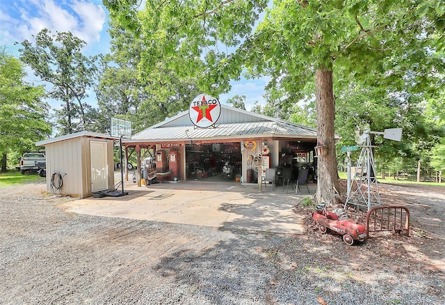 3311 Camden Rd, Marshville, NC 28103 - garage featuring a garage and a storage unit