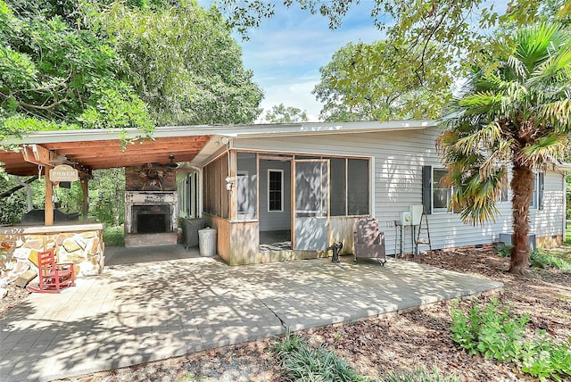 3311 Camden Rd, Marshville, NC 28103 - back of house featuring a patio, ceiling fan, and a sunroom