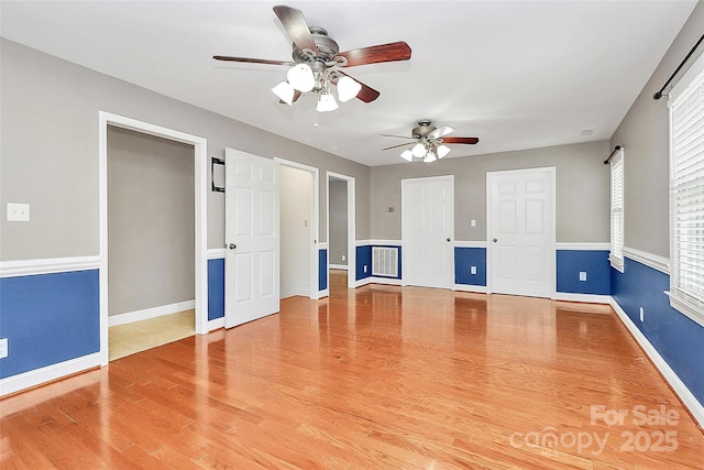 3311 Camden Rd, Marshville, NC 28103 - unfurnished living room with a ceiling fan and wood finished floors
