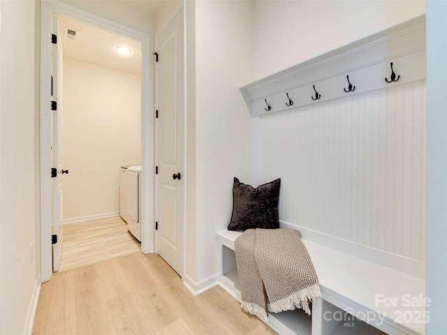 16108 Langston Dr, Charlotte, NC 28278 - mudroom featuring separate washer and dryer and light wood-style floors