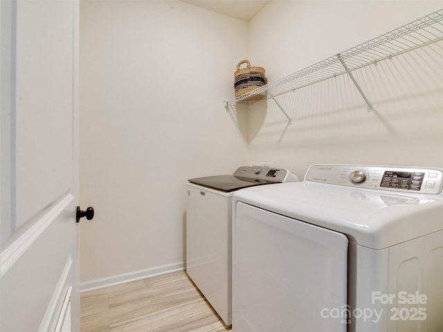 16108 Langston Dr, Charlotte, NC 28278 - laundry room featuring washing machine and dryer and light wood-style floors