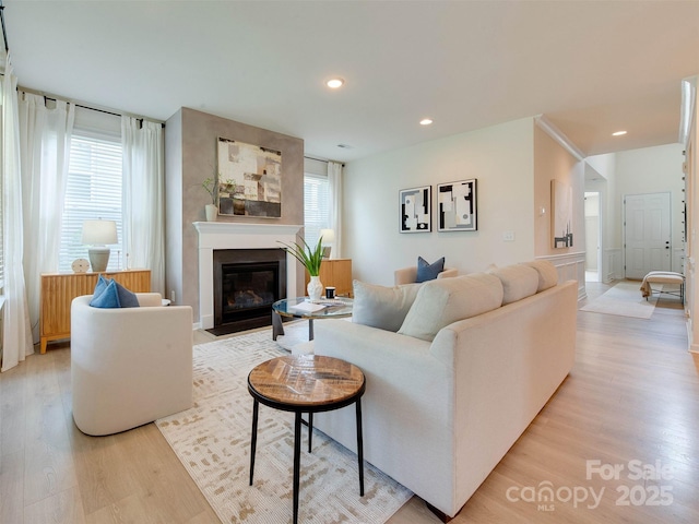 16108 Langston Dr, Charlotte, NC 28278 - living room with light wood-type flooring, a fireplace with flush hearth, and recessed lighting