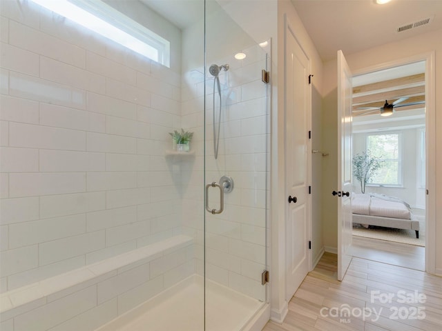 16108 Langston Dr, Charlotte, NC 28278 - ensuite bathroom with a shower stall, wood finished floors, and a ceiling fan