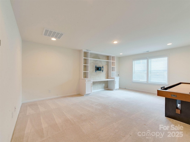 16108 Langston Dr, Charlotte, NC 28278 - recreation room with light colored carpet and recessed lighting