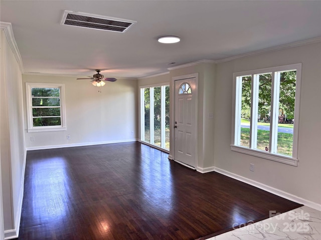 218 Hartman St, Gastonia, NC 28052 - entryway with dark wood-style flooring, crown molding, and a ceiling fan
