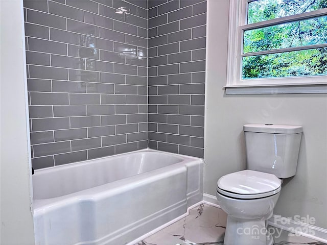 218 Hartman St, Gastonia, NC 28052 - bathroom with marble look tiles and washtub / shower combination