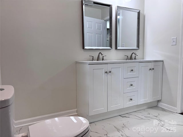 218 Hartman St, Gastonia, NC 28052 - bathroom with marble look tiles and double vanity