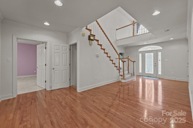 322 Oakview Dr, Salisbury, NC 28146 - foyer entrance with crown molding, stairs, recessed lighting, and wood finished floors