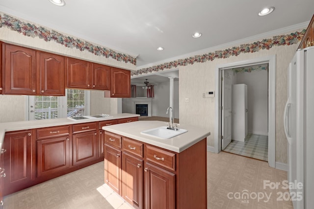 322 Oakview Dr, Salisbury, NC 28146 - kitchen featuring freestanding refrigerator, light floors, light countertops, crown molding, and recessed lighting