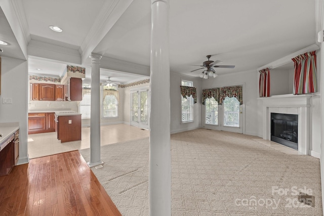 322 Oakview Dr, Salisbury, NC 28146 - unfurnished living room with ornamental molding, ceiling fan, decorative columns, a fireplace, and recessed lighting