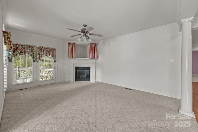 322 Oakview Dr, Salisbury, NC 28146 - unfurnished living room with ceiling fan, carpet floors, a fireplace, crown molding, and decorative columns