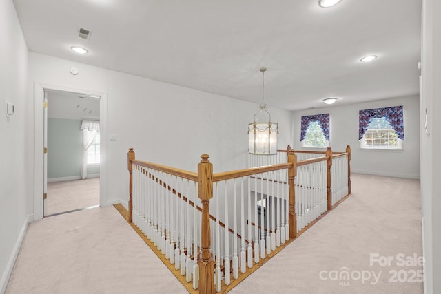 322 Oakview Dr, Salisbury, NC 28146 - hallway with an upstairs landing, carpet, a chandelier, and recessed lighting