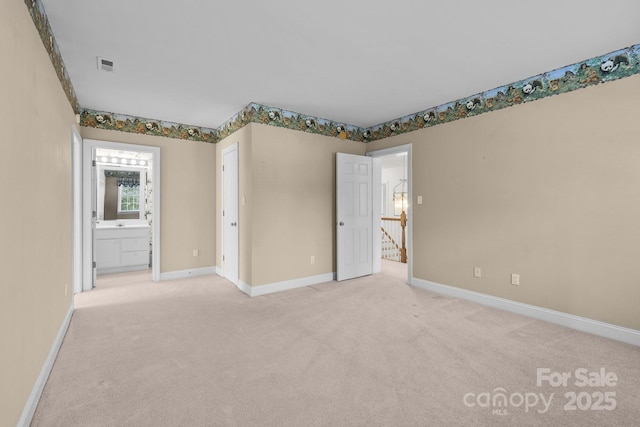 322 Oakview Dr, Salisbury, NC 28146 - unfurnished bedroom featuring carpet and connected bathroom