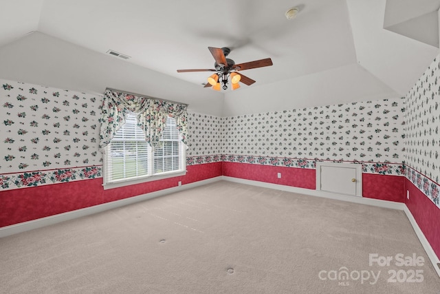322 Oakview Dr, Salisbury, NC 28146 - carpeted spare room featuring wallpapered walls, a ceiling fan, and a smoke detector