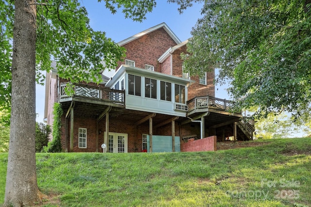 322 Oakview Dr, Salisbury, NC 28146 - rear view of property with brick siding, a wooden deck, a sunroom, stairway, and french doors
