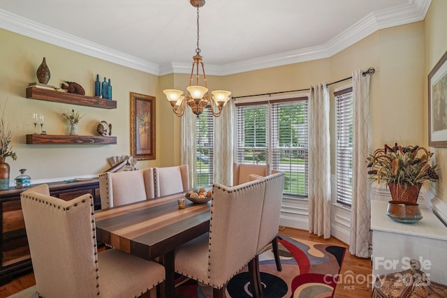 2256 Drawbridge Ct, Rock Hill, SC 29732 - dining room with a chandelier, wood finished floors, and crown molding
