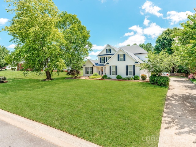 1605 Ambergate Dr, Waxhaw, NC 28173 - view of front facade featuring a front lawn and stucco siding