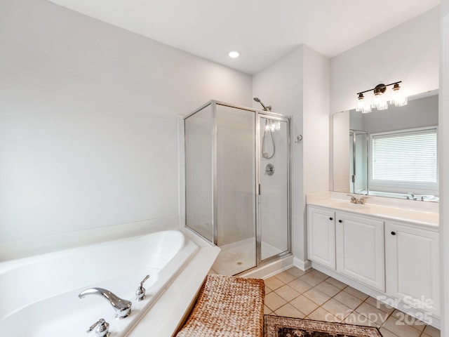 1605 Ambergate Dr, Waxhaw, NC 28173 - full bath with a shower stall, a bath, tile patterned floors, and vanity