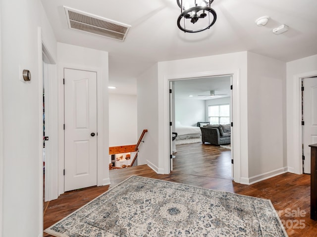 1605 Ambergate Dr, Waxhaw, NC 28173 - hallway with an upstairs landing and wood finished floors