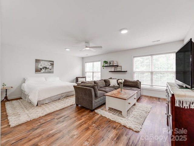 1605 Ambergate Dr, Waxhaw, NC 28173 - bedroom featuring wood finished floors, ceiling fan, and recessed lighting