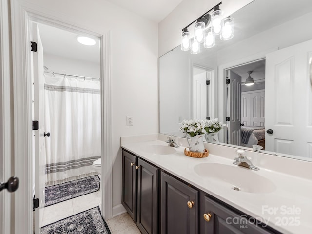 1605 Ambergate Dr, Waxhaw, NC 28173 - ensuite bathroom with double vanity and tile patterned floors