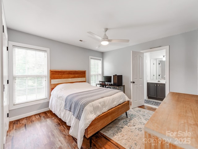 1605 Ambergate Dr, Waxhaw, NC 28173 - bedroom with light wood-type flooring, connected bathroom, and a ceiling fan