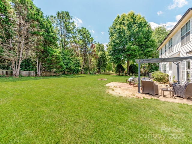 1605 Ambergate Dr, Waxhaw, NC 28173 - fenced backyard featuring a pergola, outdoor lounge area, and a patio