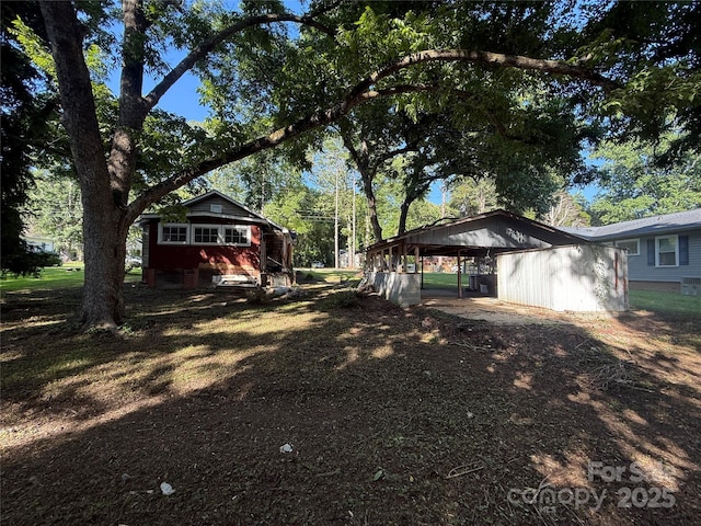 310 E Division Ave, East Spencer, NC 28039 - view of yard featuring an outdoor structure
