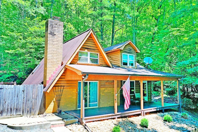 3430 Rose Creek Rd, Morganton, NC 28655 - view of front of home featuring a chimney and a forest view