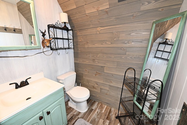 3430 Rose Creek Rd, Morganton, NC 28655 - bathroom with wooden walls, wood finished floors, and vanity