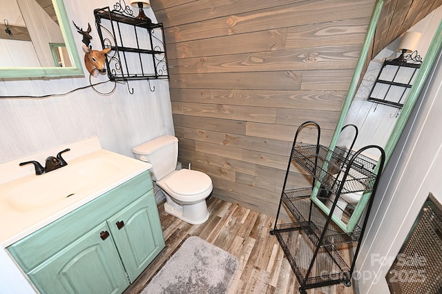 3430 Rose Creek Rd, Morganton, NC 28655 - bathroom with wooden walls, wood finished floors, and vanity