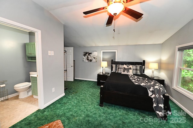 3430 Rose Creek Rd, Morganton, NC 28655 - carpeted bedroom featuring vaulted ceiling, connected bathroom, and ceiling fan