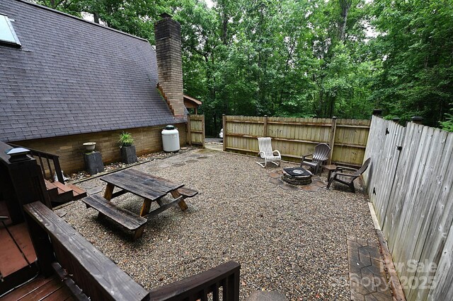 3430 Rose Creek Rd, Morganton, NC 28655 - view of patio featuring a fire pit