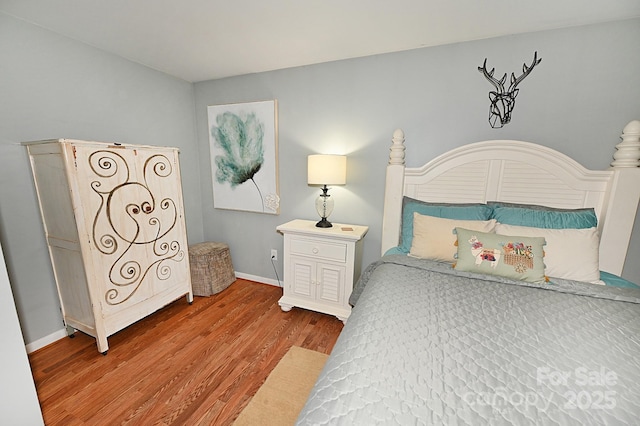 3430 Rose Creek Rd, Morganton, NC 28655 - bedroom with wood finished floors and baseboards