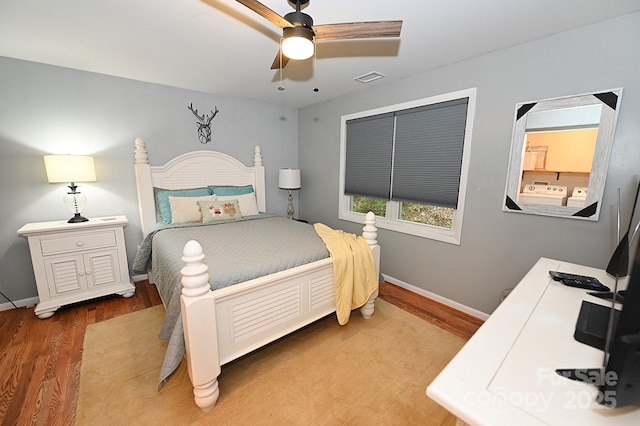 3430 Rose Creek Rd, Morganton, NC 28655 - bedroom with wood finished floors, washer and clothes dryer, and ceiling fan