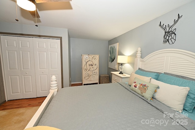 3430 Rose Creek Rd, Morganton, NC 28655 - bedroom with wood finished floors, a closet, and a ceiling fan