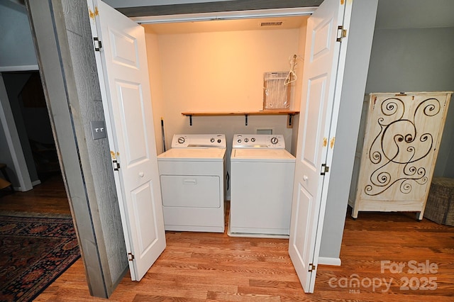 3430 Rose Creek Rd, Morganton, NC 28655 - laundry room with independent washer and dryer and light wood finished floors