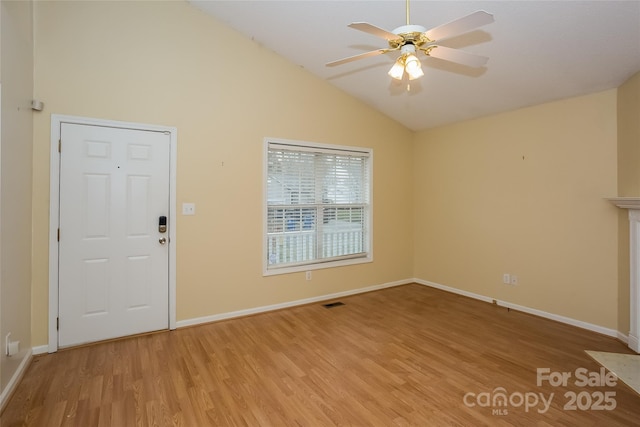 828 Saint Andrews Pl, Concord, NC 28025 - foyer entrance featuring light wood-style floors, a ceiling fan, and high vaulted ceiling