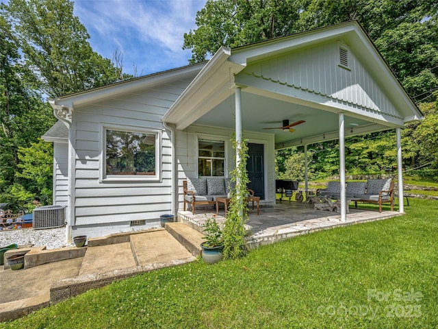 170 Twin Springs Rd, Hendersonville, NC 28792 - back of property with an outdoor living space, a ceiling fan, a yard, and a patio area