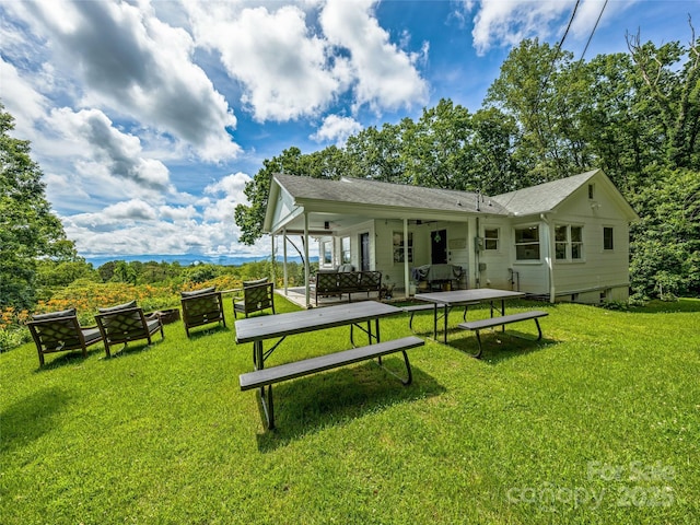 170 Twin Springs Rd, Hendersonville, NC 28792 - rear view of property with a ceiling fan, a lawn, a patio, and a shingled roof